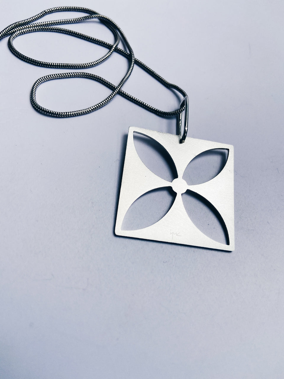 Square flower four-leafed pendant